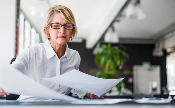 Woman looking at papers